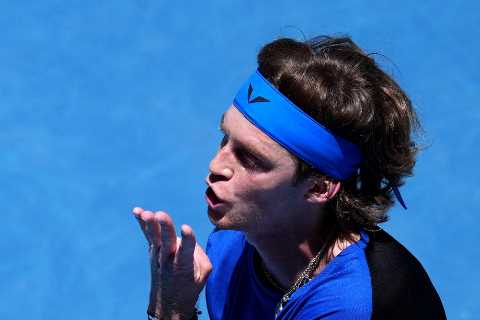 Dan Evans knocked out of Australian Open by Russia’s Andrey Rublev after Brit’s generous banana stunt goes wrong
