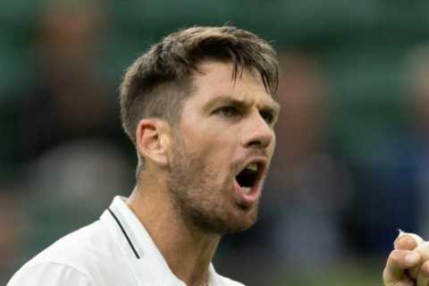 Cameron Norrie survives scare against unknown qualifier to make safe passage into Wimbledon round two on rain-hit day