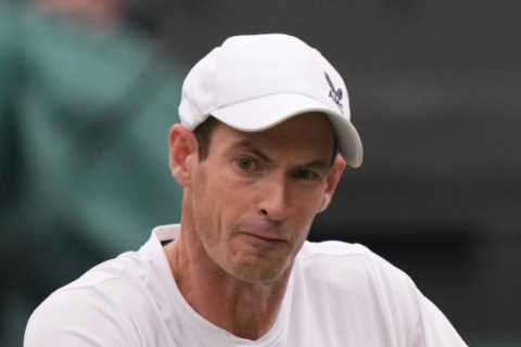 Andy Murray breezes past fellow Brit Ryan Peniston in straight sets at Wimbledon to move into second round