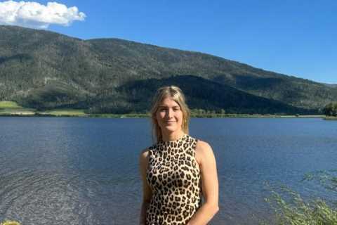 Eugenie Bouchard stuns in leopard print dress at wedding after watching Wimbledon final on her phone